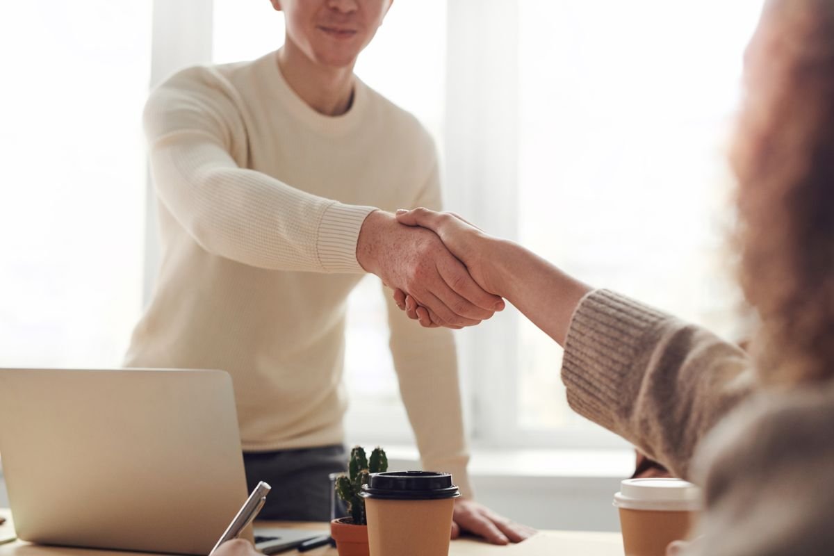 Business handshake representing trust and customer relationships