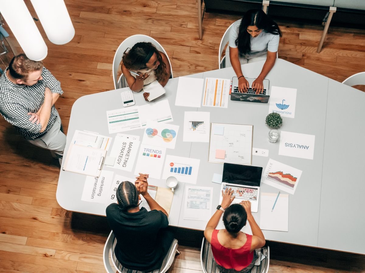 Marketing strategy and SEO analytics laid out on a table